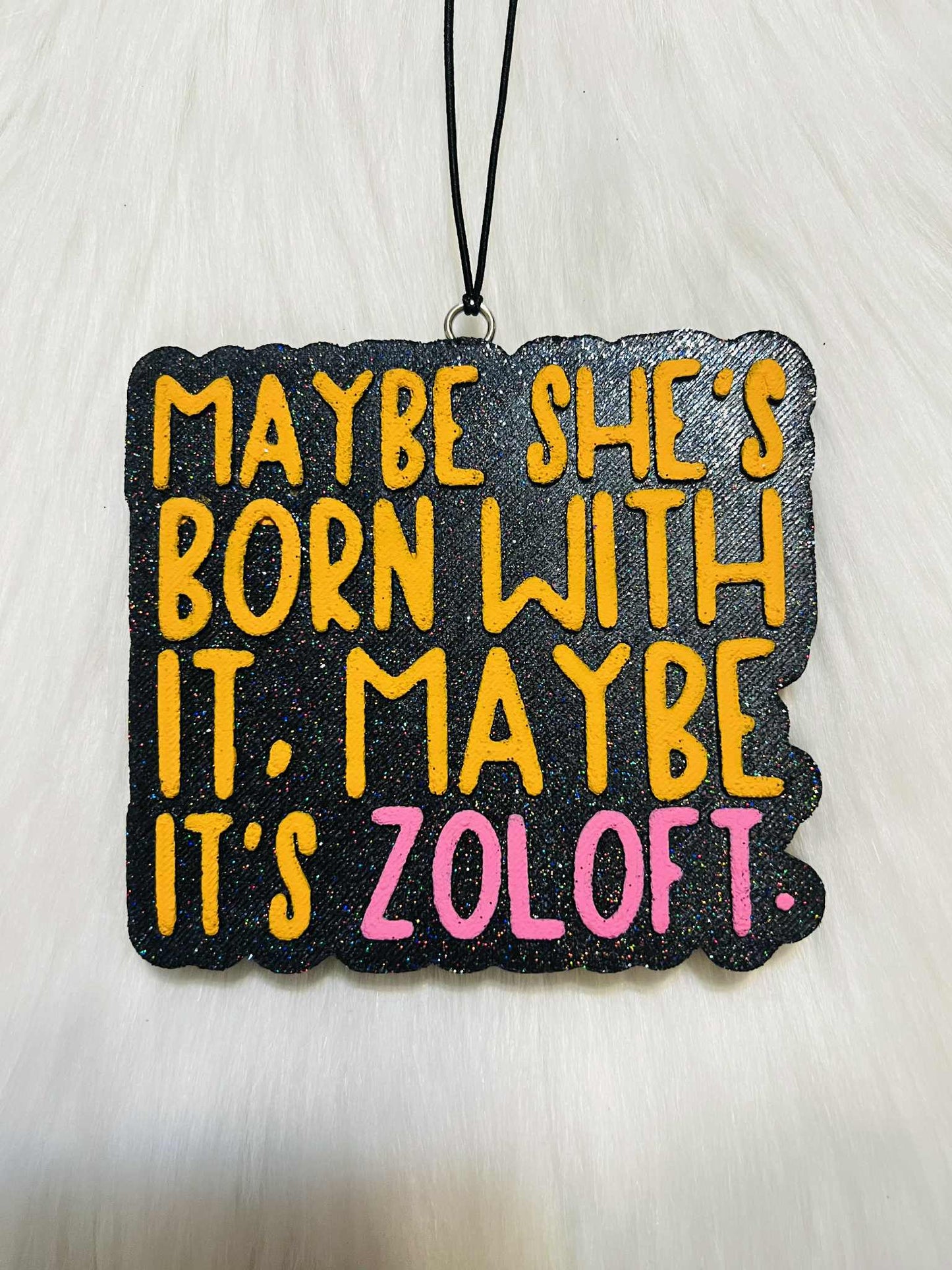 Maybe she's born with it maybe it's zoloft car freshie